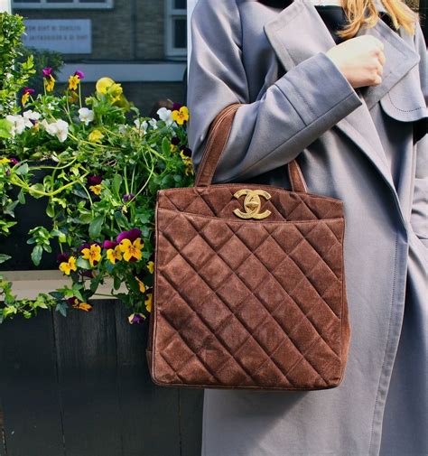 vintage brown suede chanel bag|Vintage Chanel clutch bags.